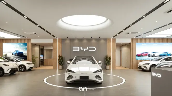 Showroom BYD moderno con auto elettriche bianche