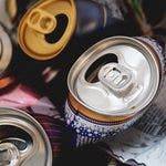 Lattine di alluminio schiacciate pronte per il riciclo