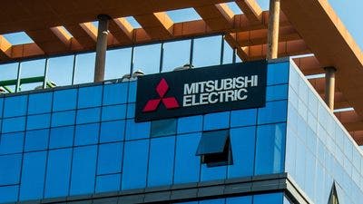 Insegna Mitsubishi Electric su edificio moderno blu