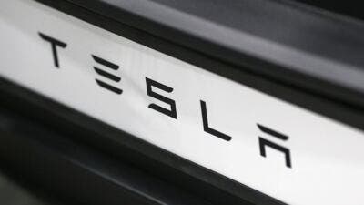 tesla badge
