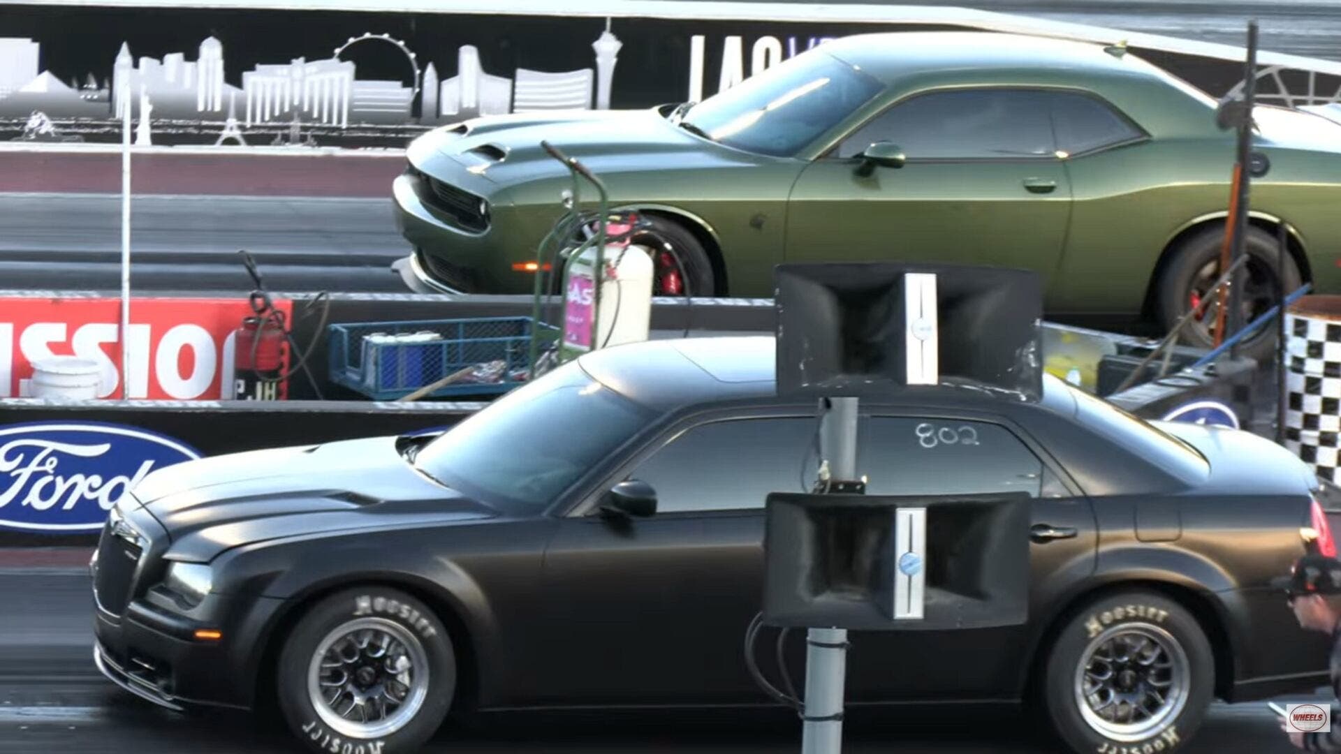 Dodge Hellcat meets Chrysler 300 SRT8 in Vegas quarter-mile drag race ...
