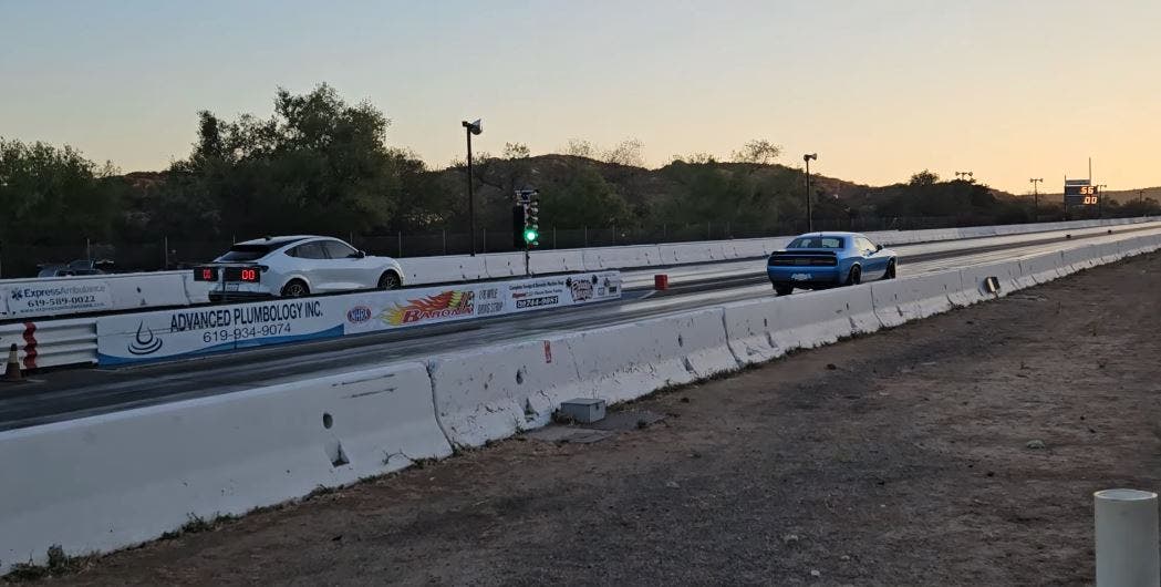 drag race mustang mach-e challenger hellcat