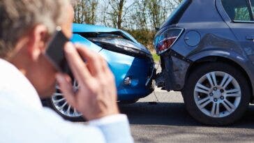 Driver Making Phone Call After Traffic Accident