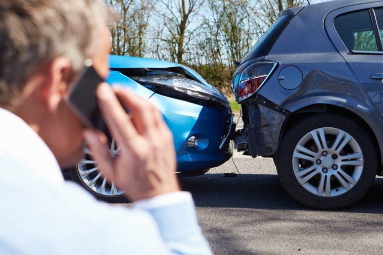 Driver Making Phone Call After Traffic Accident