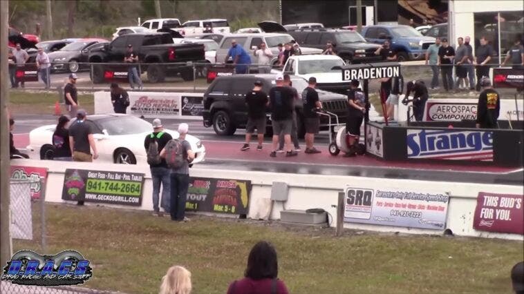 Jeep Grand Cherokee SRT8 vs Chevrolet Camaro drag race