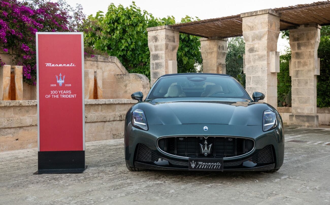 Maserati GranCabrio at the Business of Luxury Summit 2026, shown in a studio setting with a dark background and gold accents