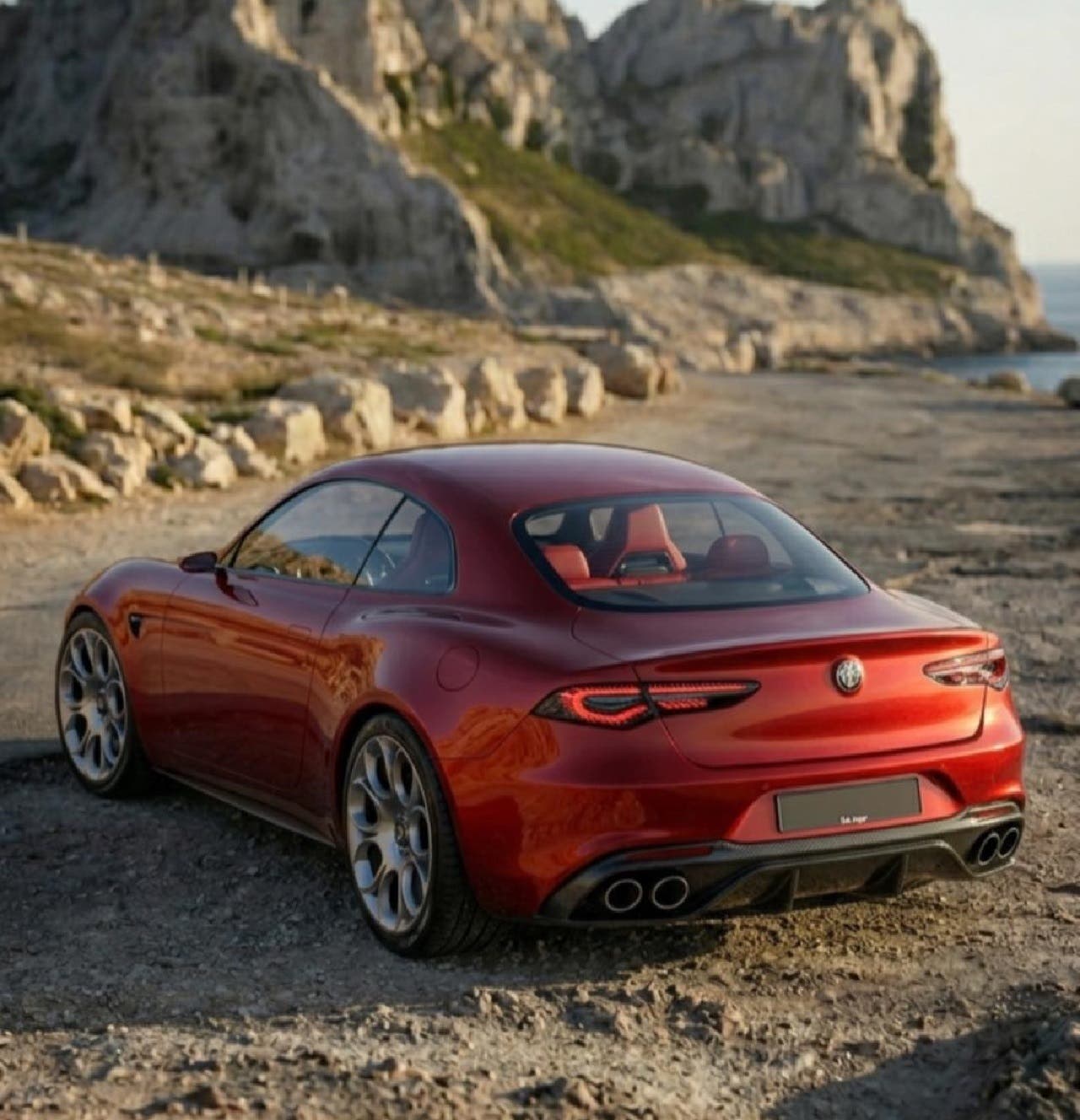 Vista di tre quarti posteriore della nuova Alfa Romeo coupé, con coda raccolta, fanali sottili, lunotto ampio e quattro terminali di scarico