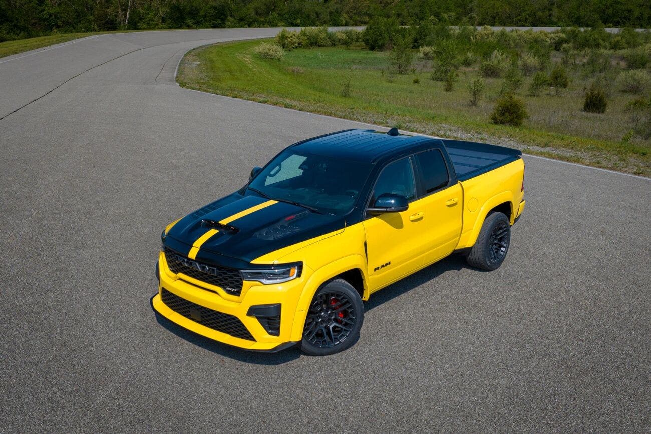 Ram Rumble Bee SRT pickup in yellow and black racing livery, highlighting the performance model’s aggressive styling
